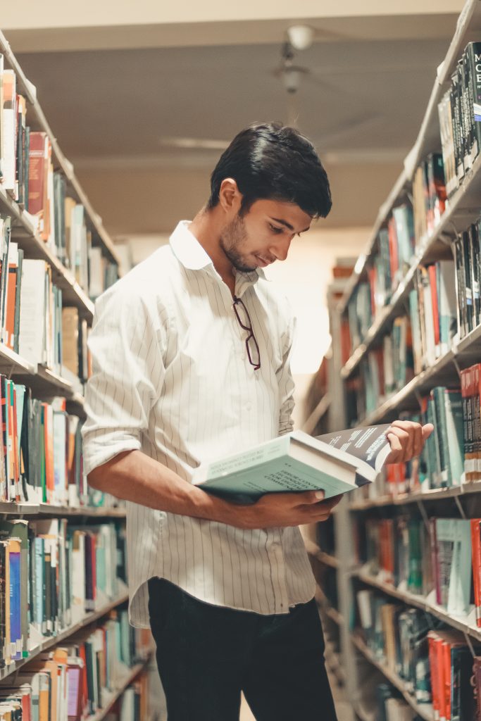 Student in Library studying for Government Jobs in Kerala.